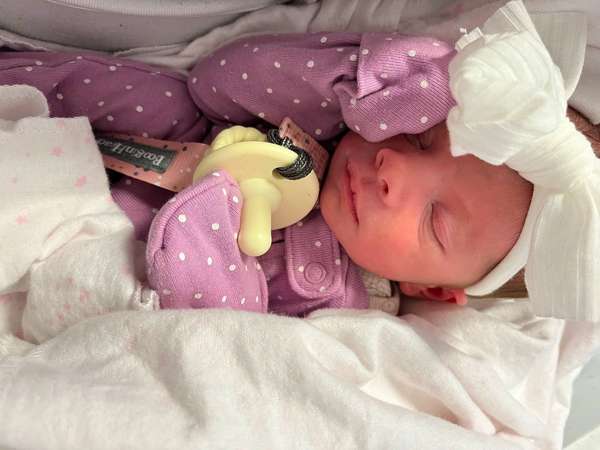 Jersey joined the competition — help win amazing prizes! baby, baby_products, baby_sleeping, baby_toddler_clothing, bedding, bedtime, cheek, child, comfort, eyelash, headwear, linens, magenta, nap, pattern, person, pink, purple, room, sleep