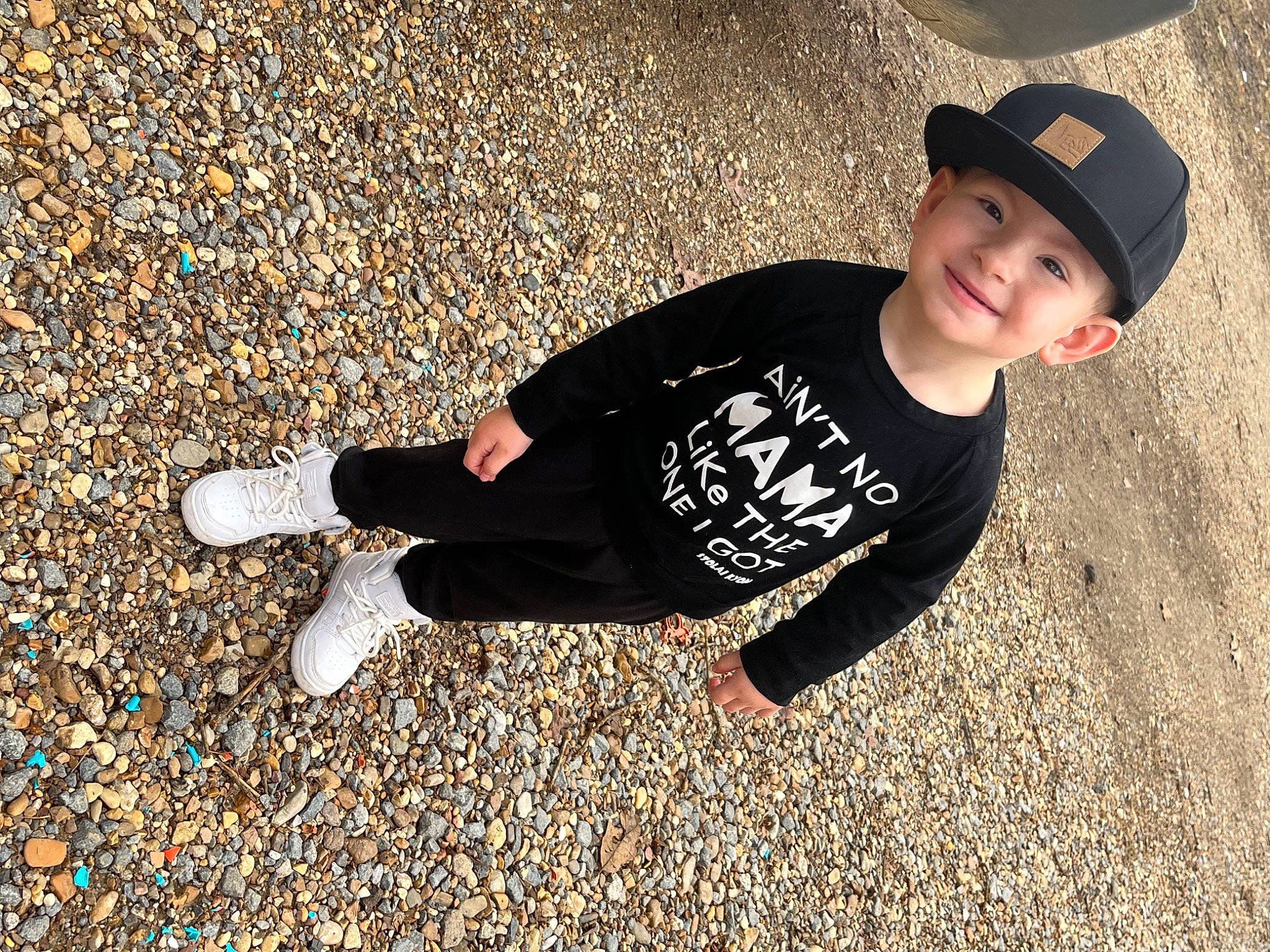 Maddox is registered to the contest to win money with this photo: asphalt, cap, child, flash_photography, fun, grass, happy, hat, headwear, human_body, joy, people_in_nature, person, road_surface, sand, sleeve, smile, soil, sun_hat, t_shirt