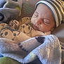 Elijah is registered to the contest to win money with this photo: baby, sleeping, blanket, hat, infant, cozy, soft, peaceful, child, cute, clothing, portrait, closeup, face, rest, warmth, comfort, newborn, toddler, indoors