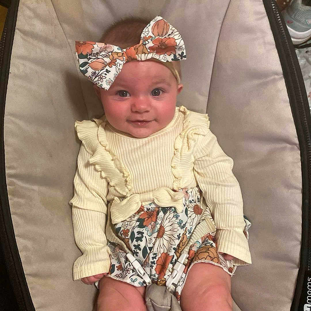 Aliyah is registered to the contest to win money with this photo: accessories, baby, clothing, coat, costume, cushion, dress, face, furniture, glasses, hat, head, homedecor, jacket, jewelry, necklace, person, photography, portrait, sunglasses