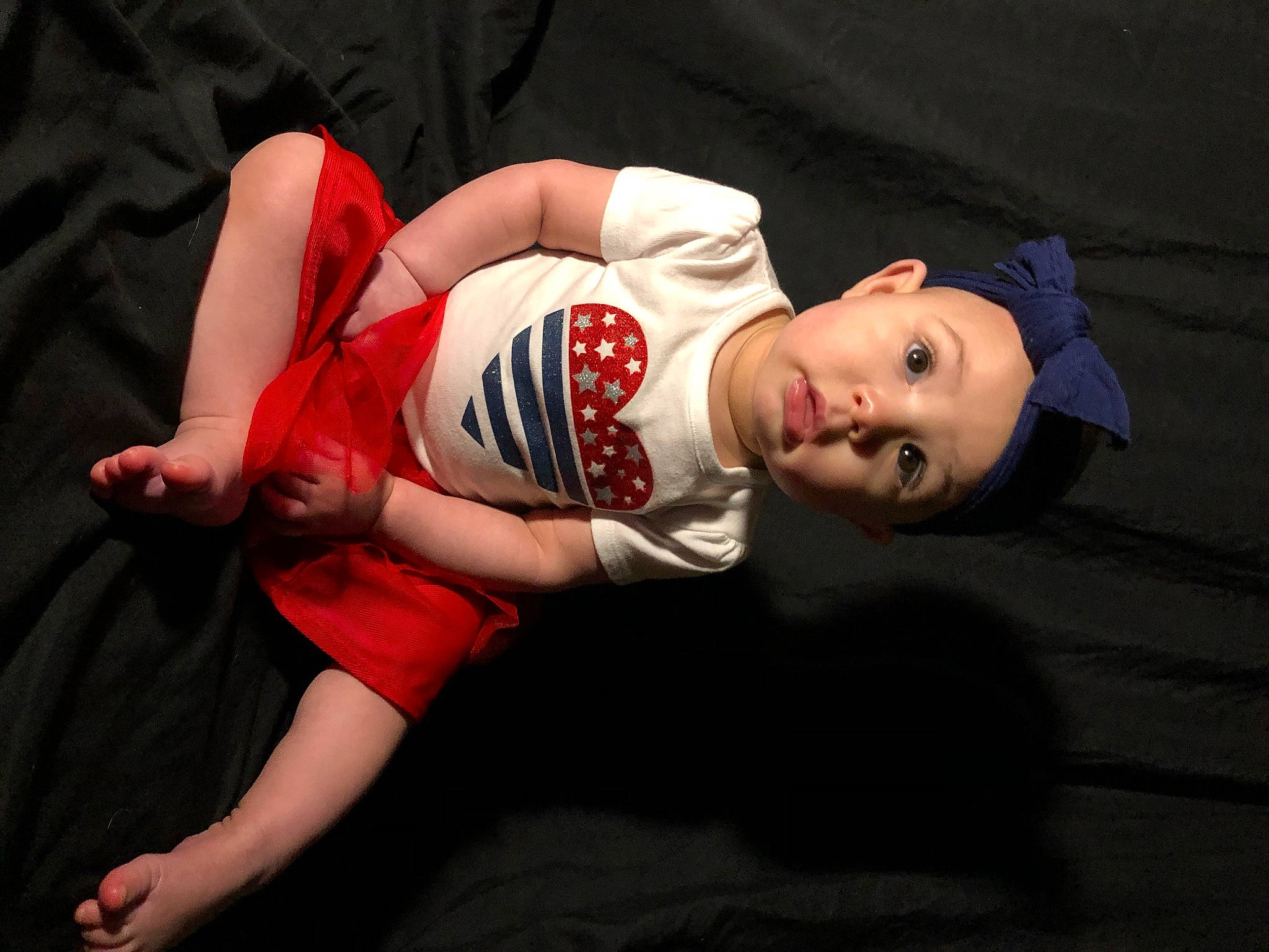Persephone is registered to the contest to win money with this photo: arm, child, headwear, human_body, leg, person, surprise