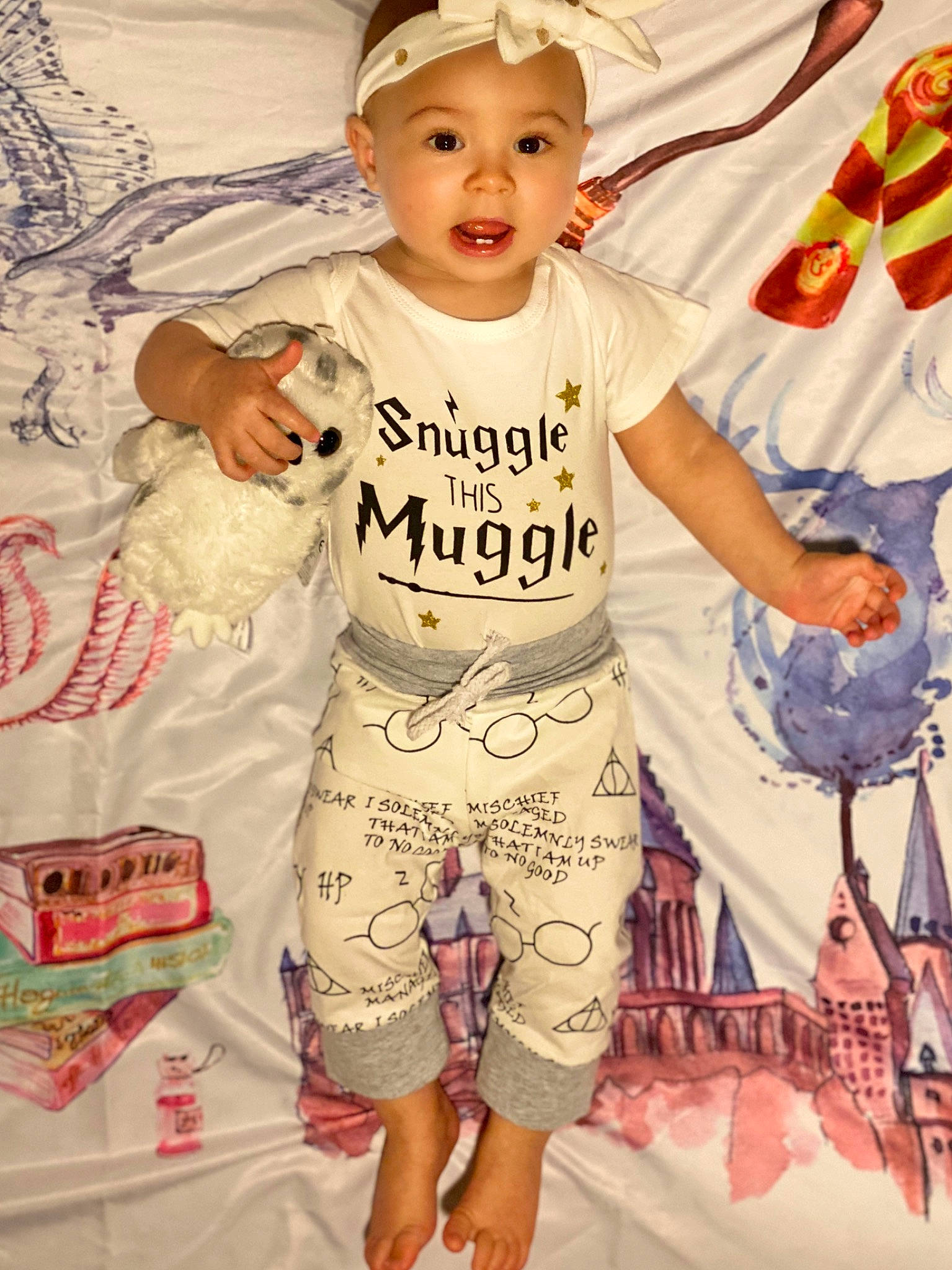 Persephone is registered to the contest to win money with this photo: baby, baby_toddler_clothing, child, design, happy, headwear, pattern, person, product, sleeve, t_shirt, textile, toddler