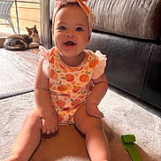 Katara joined the competition — help win amazing prizes! baby, carpet, cat, child, clothing, couch, cute, floor, furniture, glass_door, headband, home, indoor, infant, pet, playful, sitting, smiling, toy, window