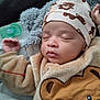 Noah -Lamine participe au concours pour gagner de l'argent avec cette photo : apparel, baby, bear, blanket, child, clothing, cozy, cute, face, hat, indoors, infant, newborn, pacifier, peaceful, portrait, resting, sleeping, soft, warm