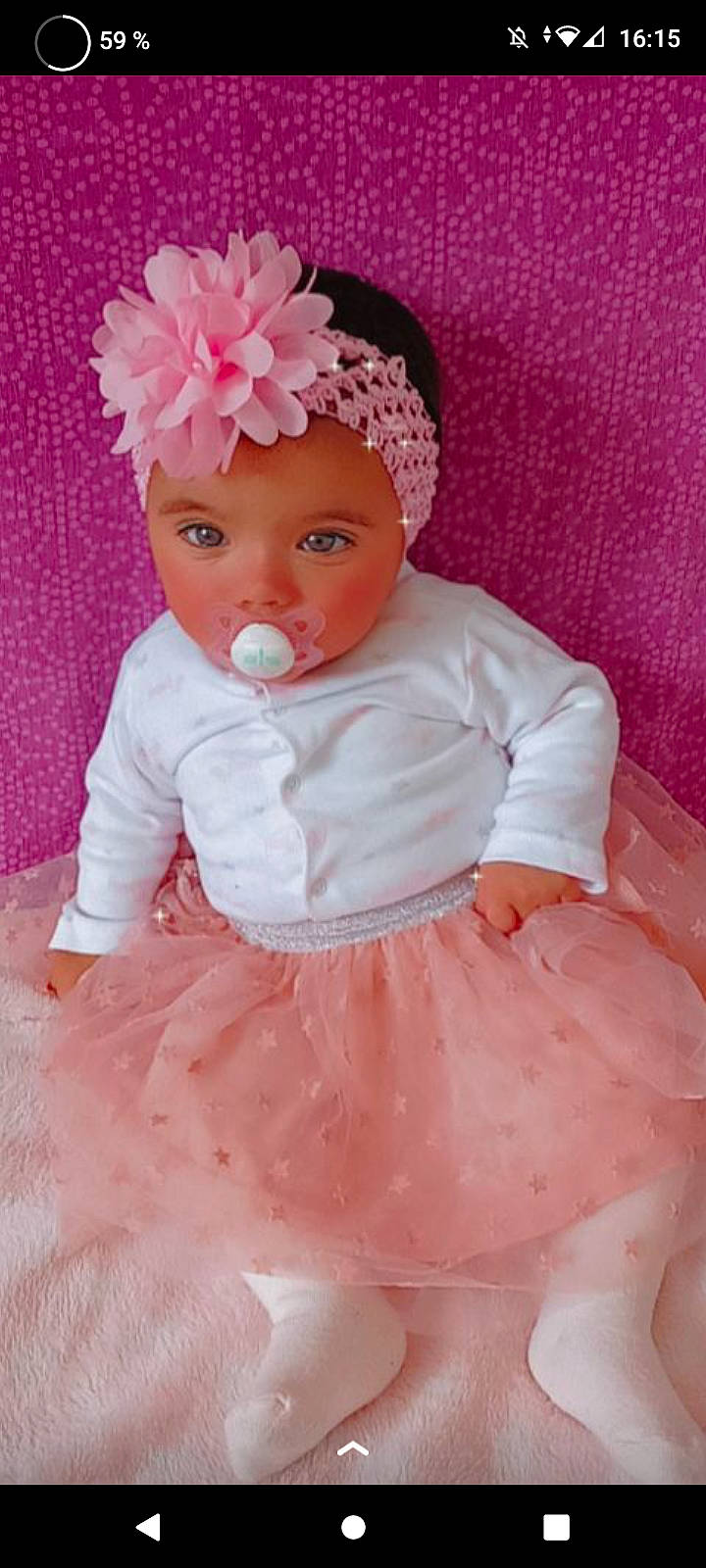 Serena participe au concours pour gagner de l'argent avec cette photo : baby, baby_toddler_clothing, cheek, dress, embellishment, flower, hairstyle, hat, head, headgear, headpiece, headwear, lip, magenta, person, petal, pink, ruffle, skin, sleeve