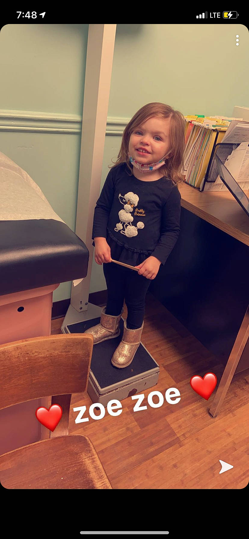 Zoey is registered to the contest to win money with this photo: active_pants, ankle, baby_toddler_clothing, boot, carpet, child_model, floor, flooring, foot, hardwood, human_leg, joy, knee, laminate_flooring, leg, person, play, sock, sweatpant, toddler