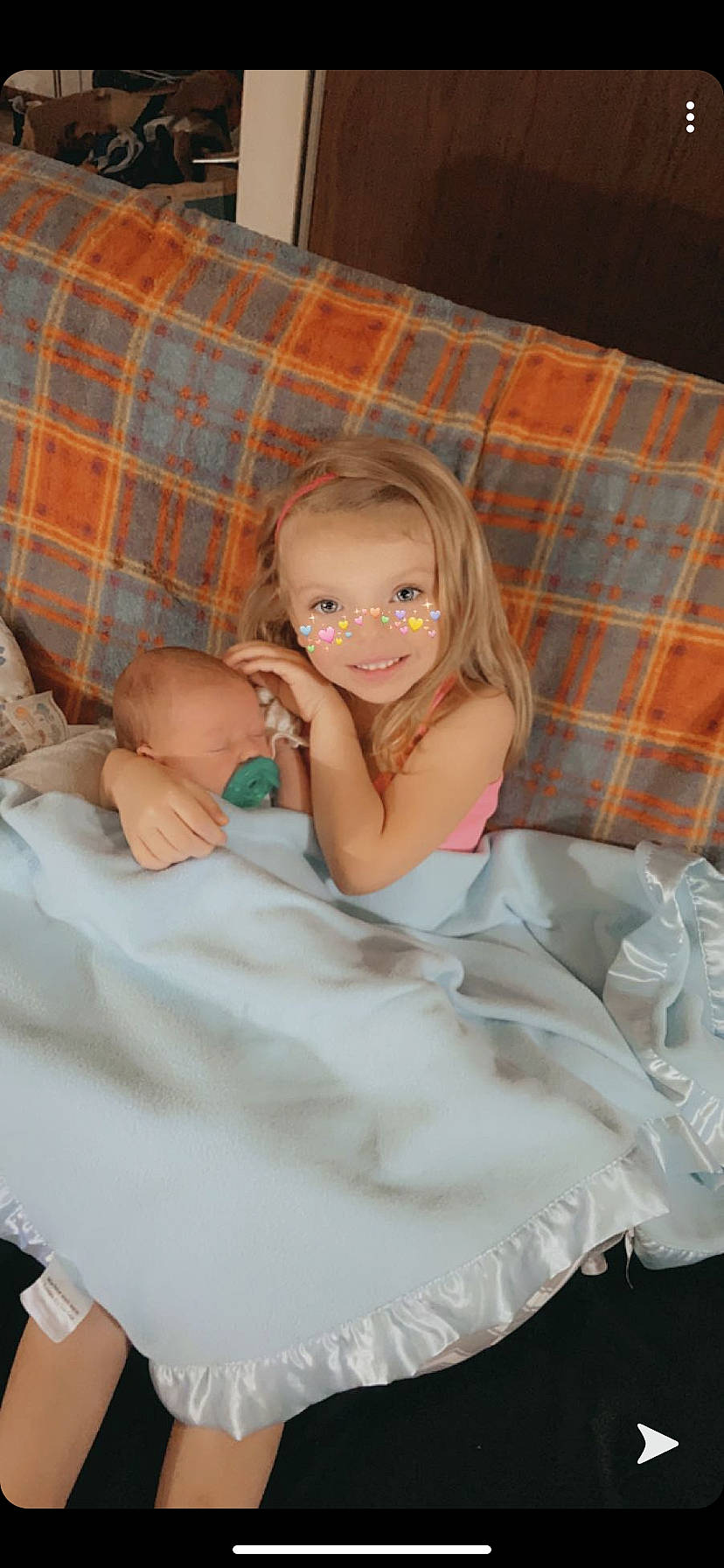 Delaney joined the competition — help win amazing prizes! baby, baby_products, baby_safety, baby_toddler_clothing, bedding, blond, child, comfort, couch, foot, infant_bed, joy, linens, love, peach, person, plaid, stomach, tartan, textile