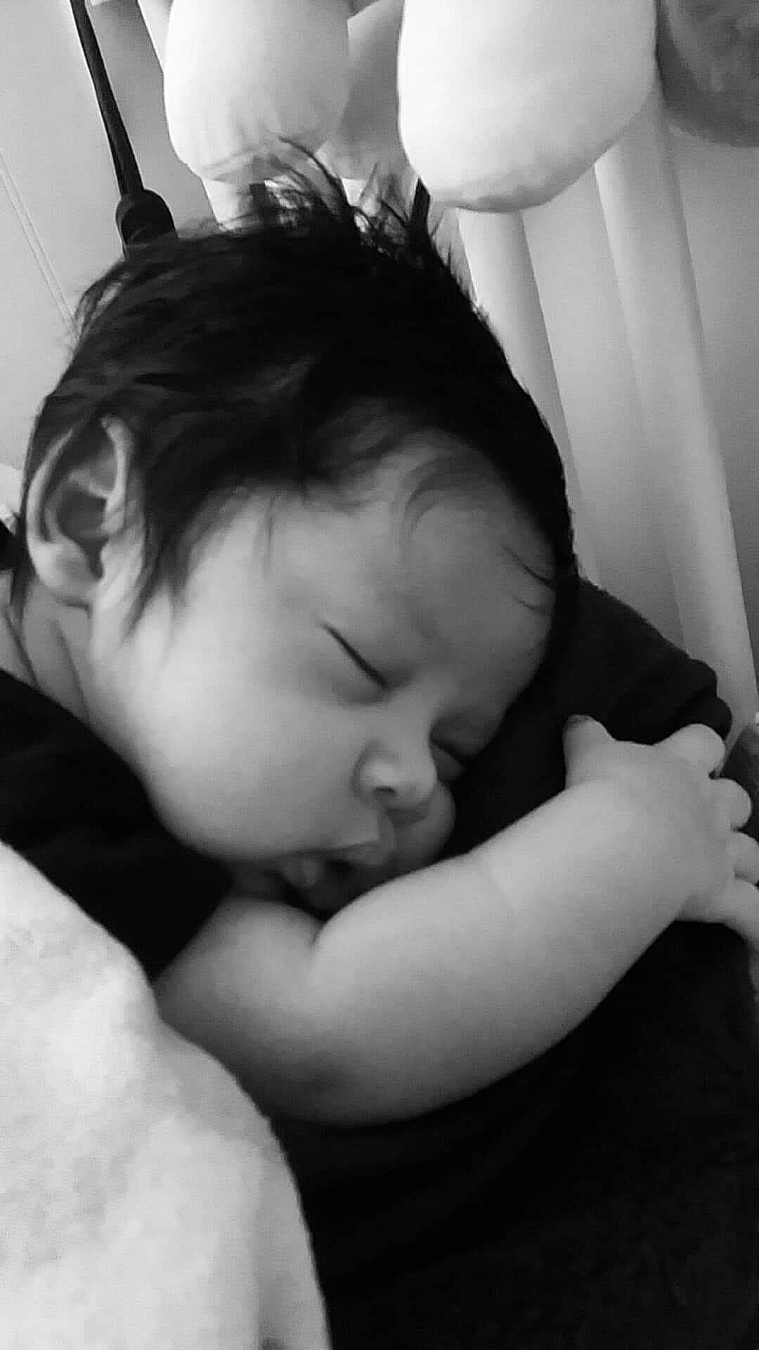 Jakye is registered to the contest to win money with this photo: arm, baby, beauty, bedtime, black, black_and_white, cheek, child, ear, eye, face, hand, head, monochrome_photography, nap, nose, person, photography, skin, sleep