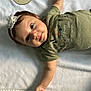 Adleigh joined the competition — help win amazing prizes! baby, infant, child, headband, flower, onesie, green_clothing, blue_eyes, milestone_marker, three_months, blanket, soft_texture, lying_down, cute, smiling, portrait, wooden, milestone, indoor, person
