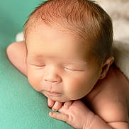 Mavrik joined the competition — help win amazing prizes! newborn, baby, infant, sleeping, peaceful, closeup, face, skin, hand, head, soft, teal_background, portrait, child, cute, resting, calm, young, human, tiny