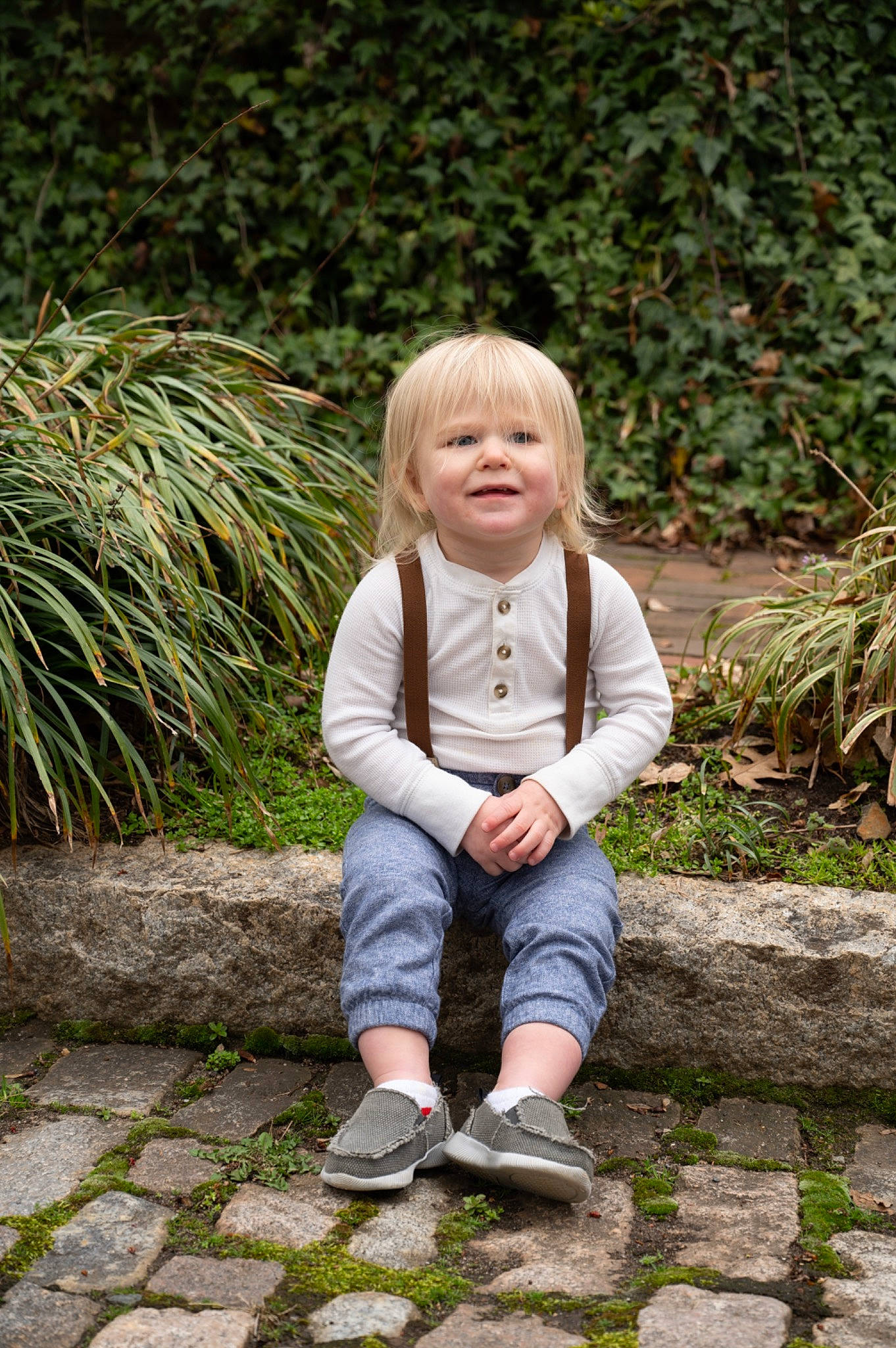 Maverick is registered to the contest to win money with this photo: baby, baby_toddler_clothing, botany, child, eye, facial_expression, fun, garden, grass, grass_family, groundcover, happy, joy, leisure, people_in_nature, person, plant, sitting, skin, smile