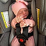 Dillon joined the competition — help win amazing prizes! baby, newborn, car_seat, pink_clothing, hat, bow, sleeping, infant, child, straps, safety, warning_label, seatbelt, cozy, cute, tiny_hands, resting, portrait, indoors, soft_lighting