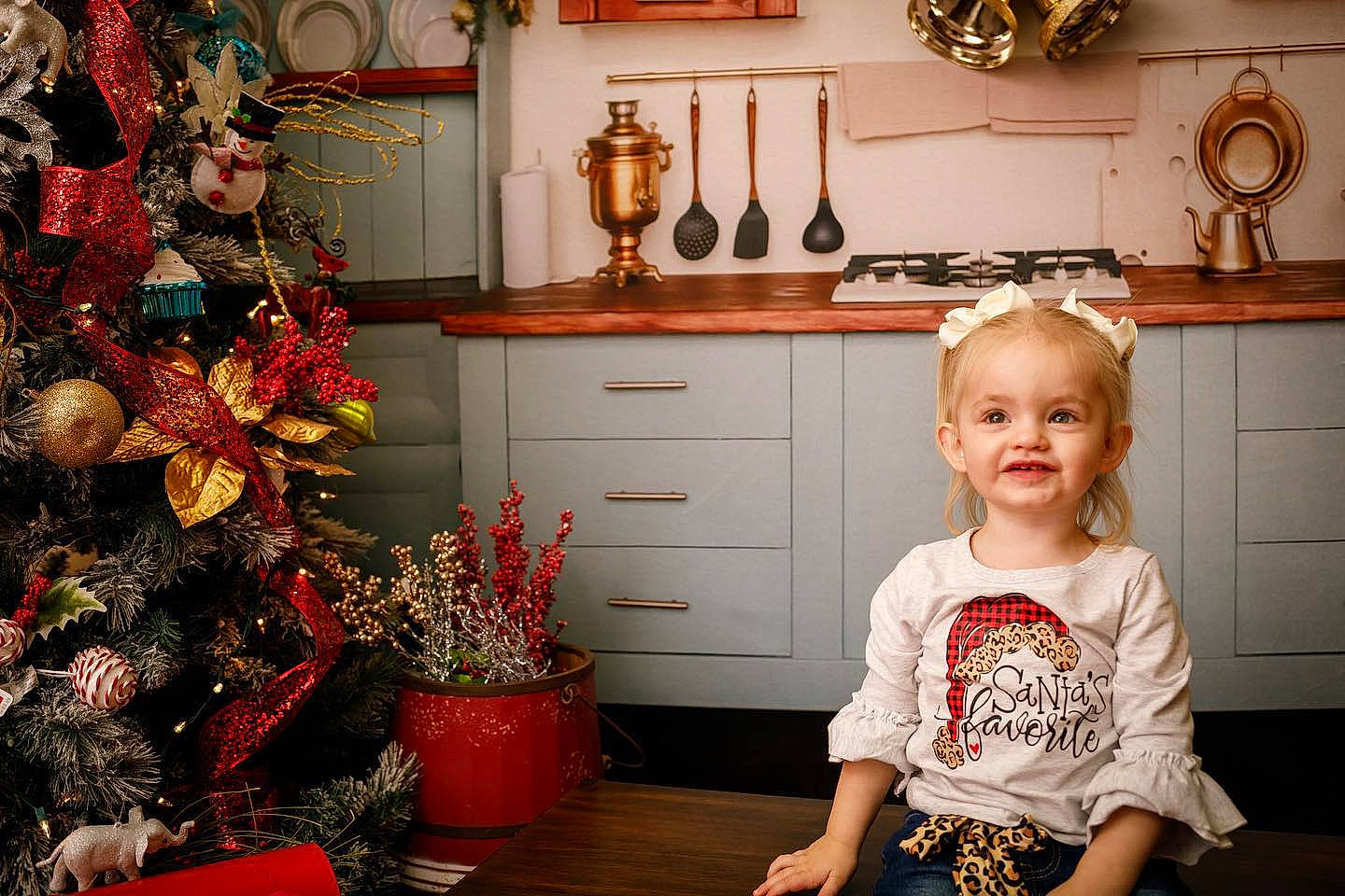 Nebula is registered to the contest to win money with this photo: cabinetry, chest_of_drawers, christmas_tree, countertop, drawer, flooring, furniture, home_appliance, interior_design, joy, kitchen, kitchen_appliance, lighting, living_room, orange, person, photograph, picture_frame, plate, tableware