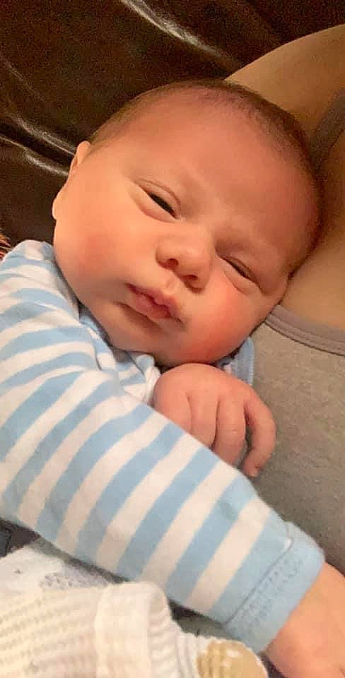 Kamryn is registered to the contest to win money with this photo: baby, baby_sleeping, bedtime, cheek, child, chin, eye, face, finger, forehead, gesture, hand, head, lip, mouth, nap, nose, person, skin, sleep