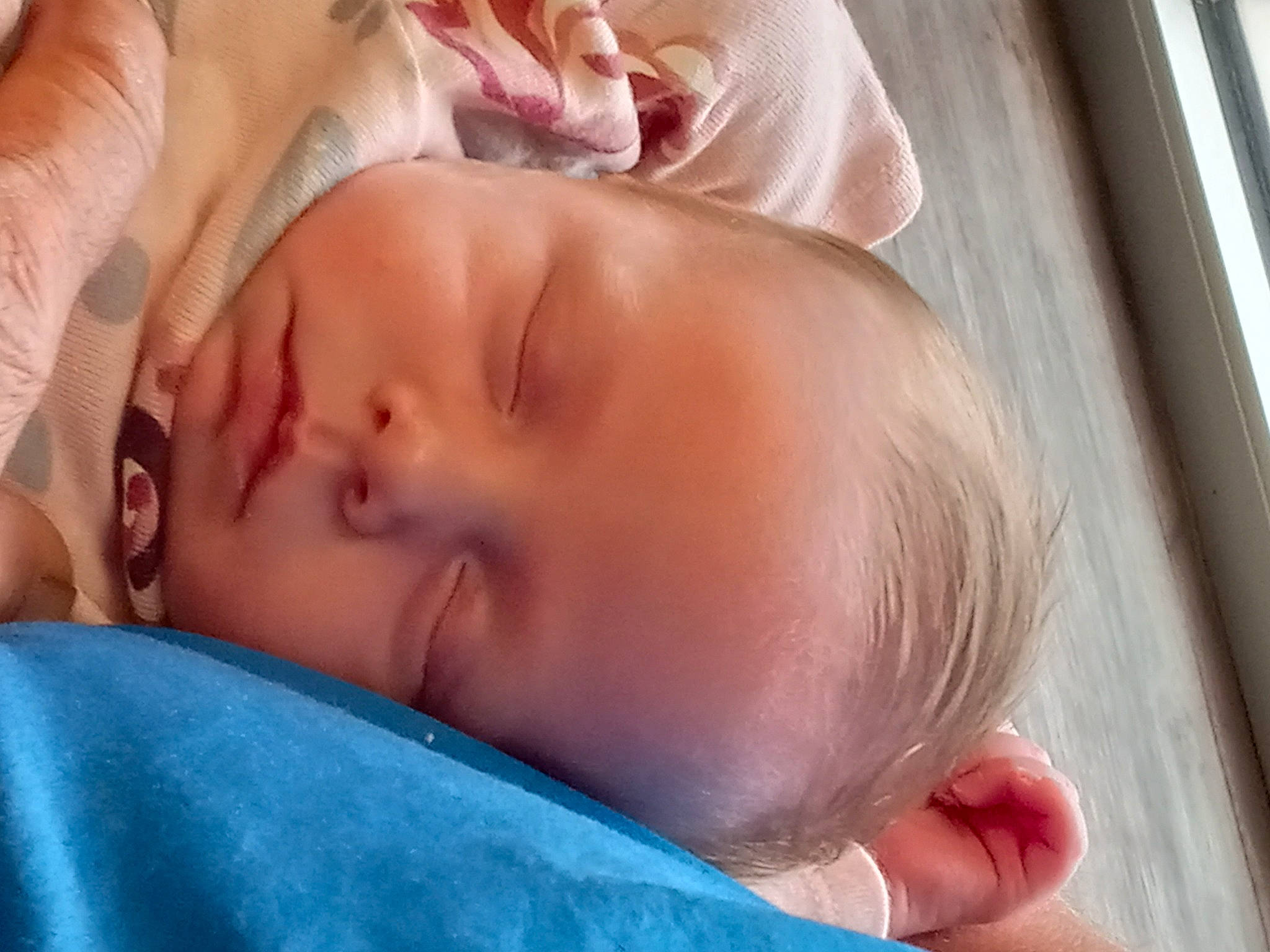 Layla is registered to the contest to win money with this photo: baby, baby_toddler_clothing, cheek, chin, comfort, ear, eyebrow, eyelash, finger, forehead, hair, hand, human_body, iris, lip, mouth, neck, nose, person, skin