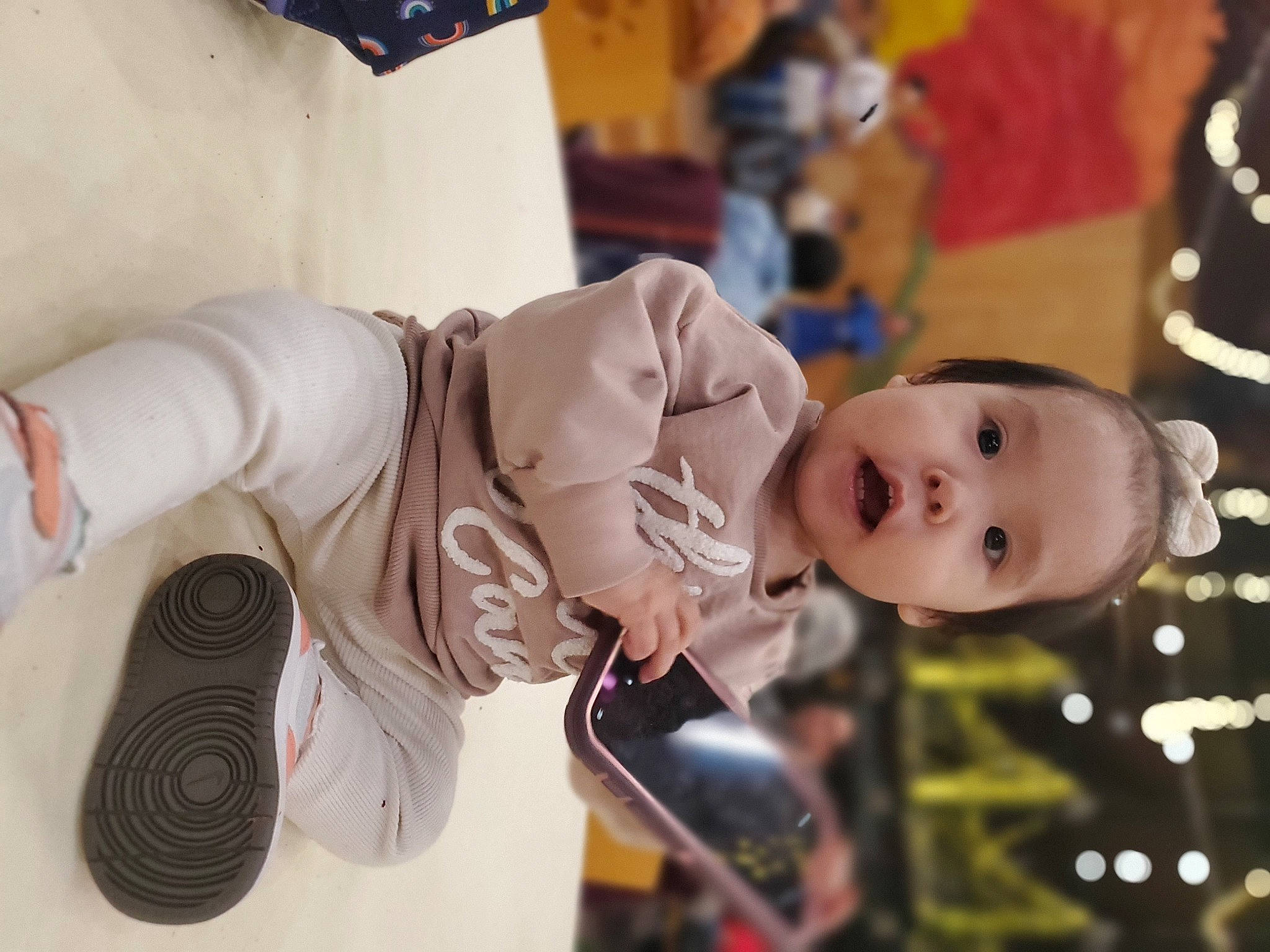 Agnes joined the competition — help win amazing prizes! audio_equipment, baby, child, event, fun, glove, happy, mechanical_fan, person, personal_protective_equipment, plant, toddler, tree, winter
