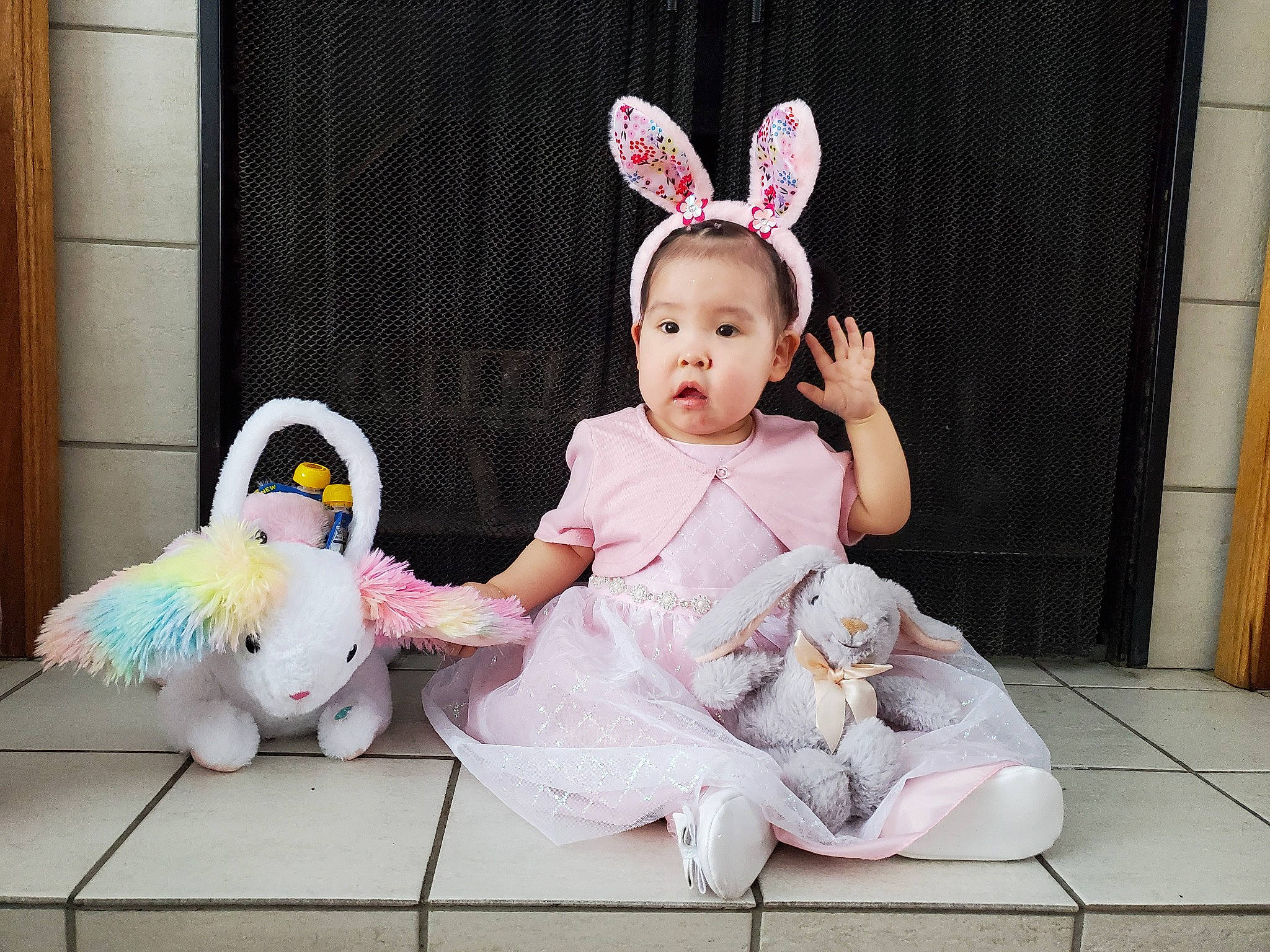 Agnes is registered to the contest to win money with this photo: baby, baby_toddler_clothing, child, costume_hat, dress, event, fawn, foot, fur, happy, hat, headband, headpiece, person, pink, rabbit, rabbits_and_hares, sitting, sleeve, toddler