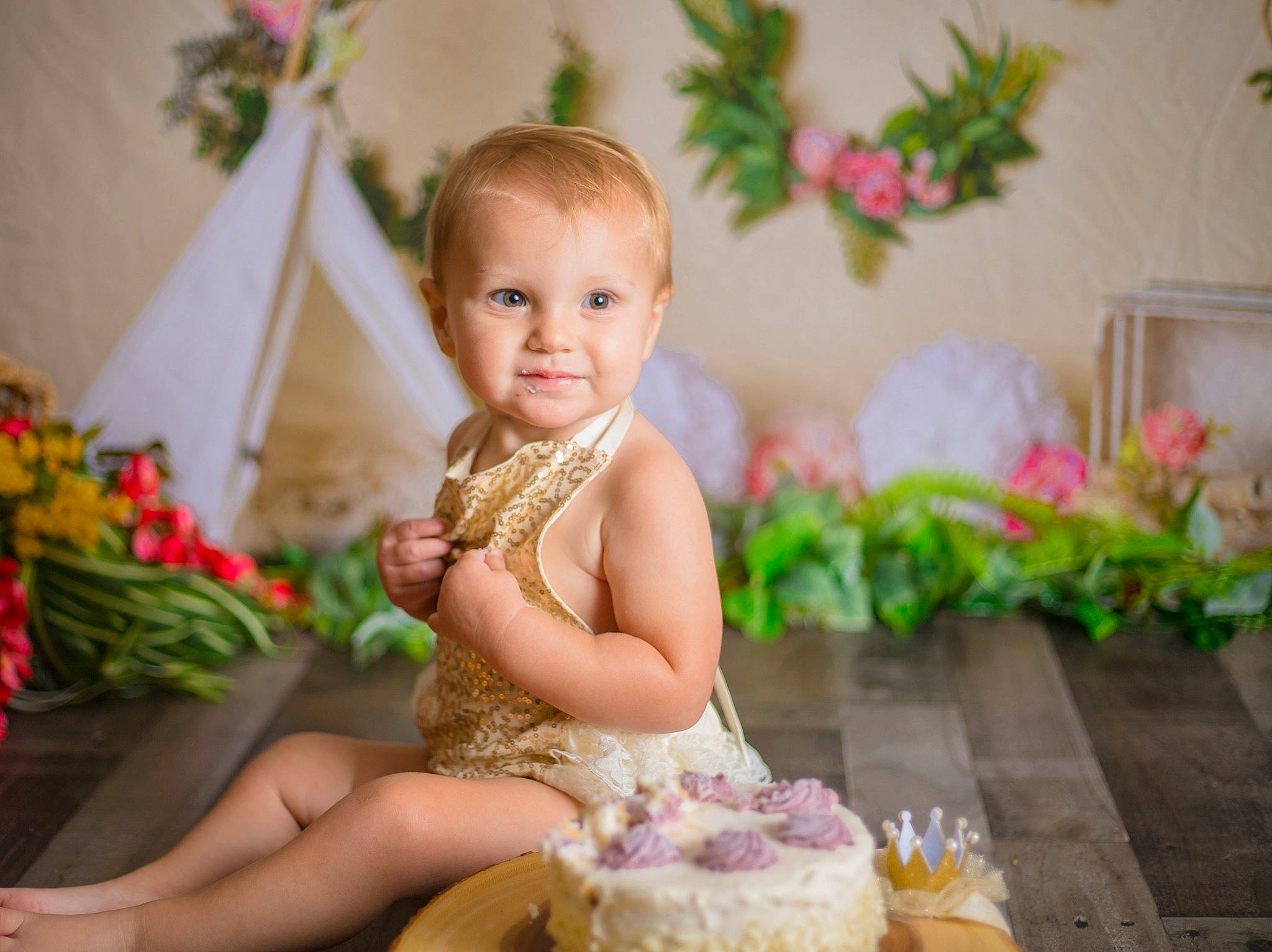 Nora Jean is registered to the contest to win money with this photo: baby, birthday, cake, child, fashion_accessory, floristry, flower, headgear, person, sitting, smile, sweetness, toddler