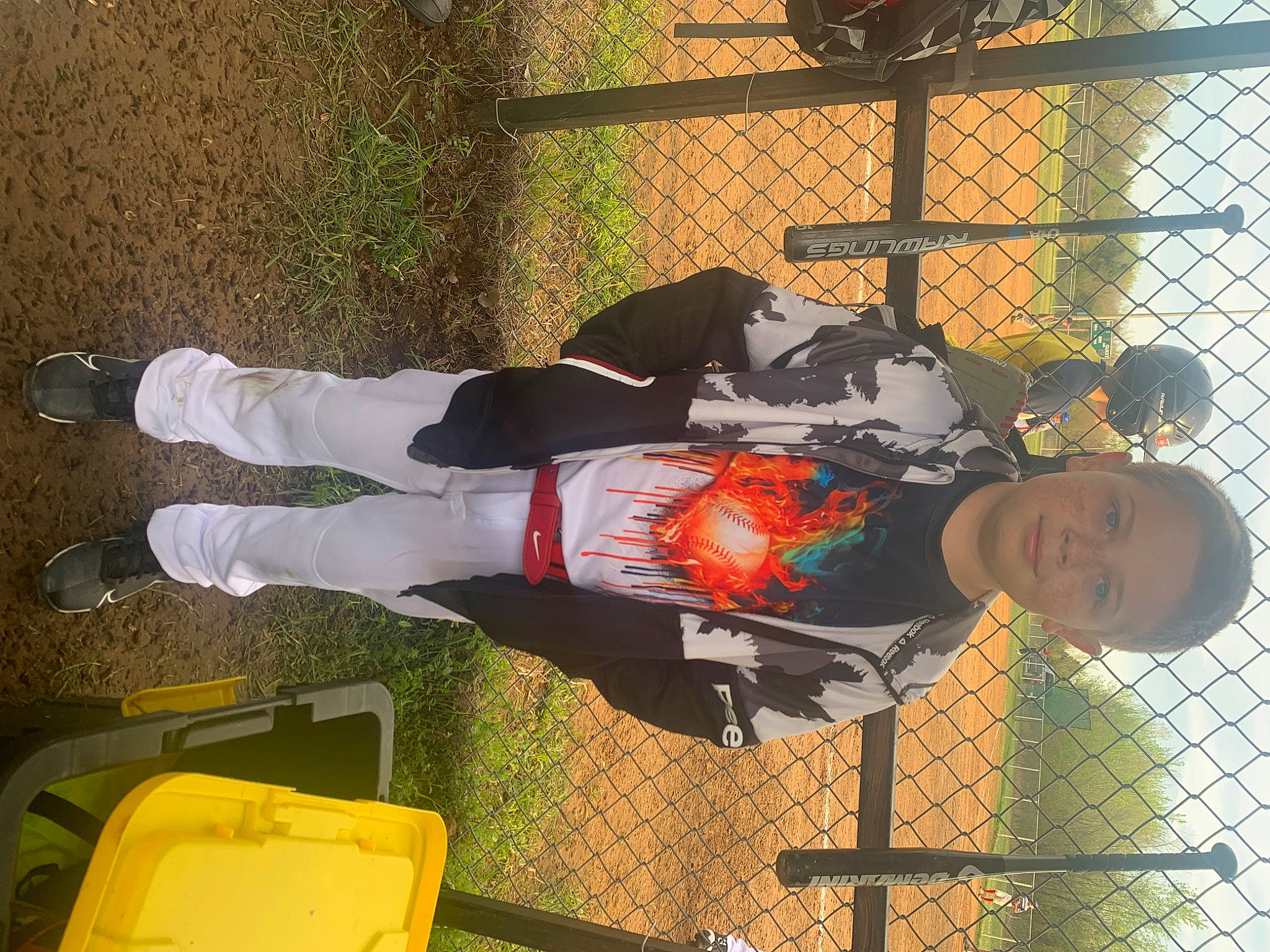 Levi joined the competition — help win amazing prizes! boot, chain_link_fencing, fence, fun, hat, leisure, luggage_and_bags, mesh, metal, outdoor_shoe, person, plant, recreation, shoe, smile, sneakers, walking_shoe, wire_fencing