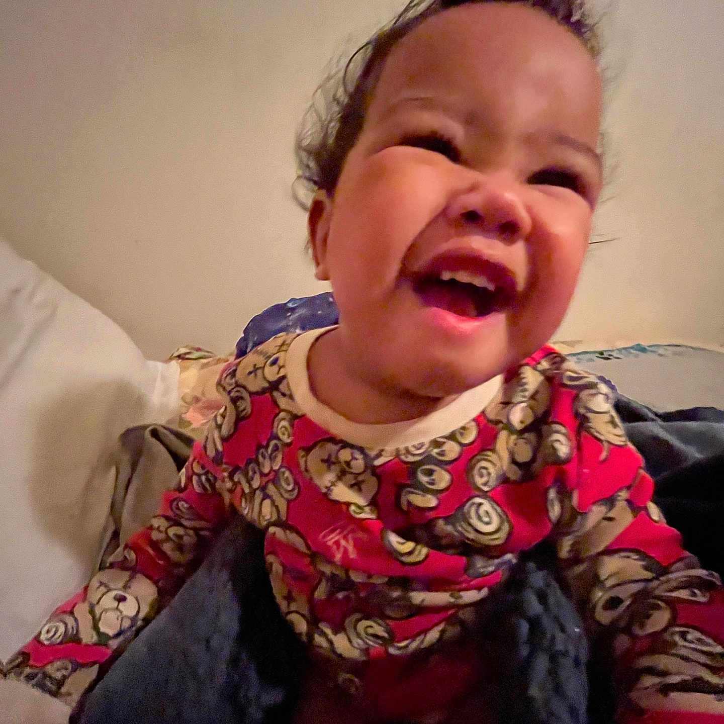 Traviis joined the competition — help win amazing prizes! baby, bed, blanket, child, clothing, cozy, cute, face, fun, happy, indoor, infant, laughing, pajamas, person, portrait, smiling, toddler, warm, young