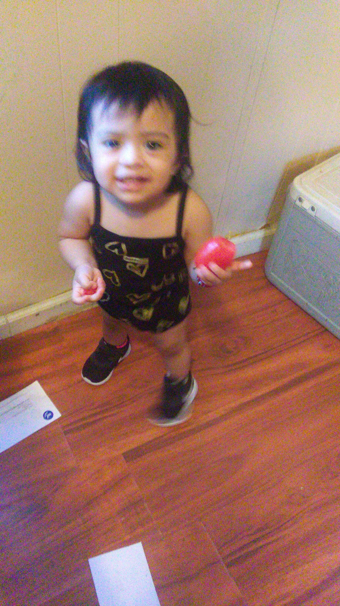 Alessandra is registered to the contest to win money with this photo: child, floor, flooring, hardwood, joy, laminate_flooring, person, play, skin, standing, toddler, wood