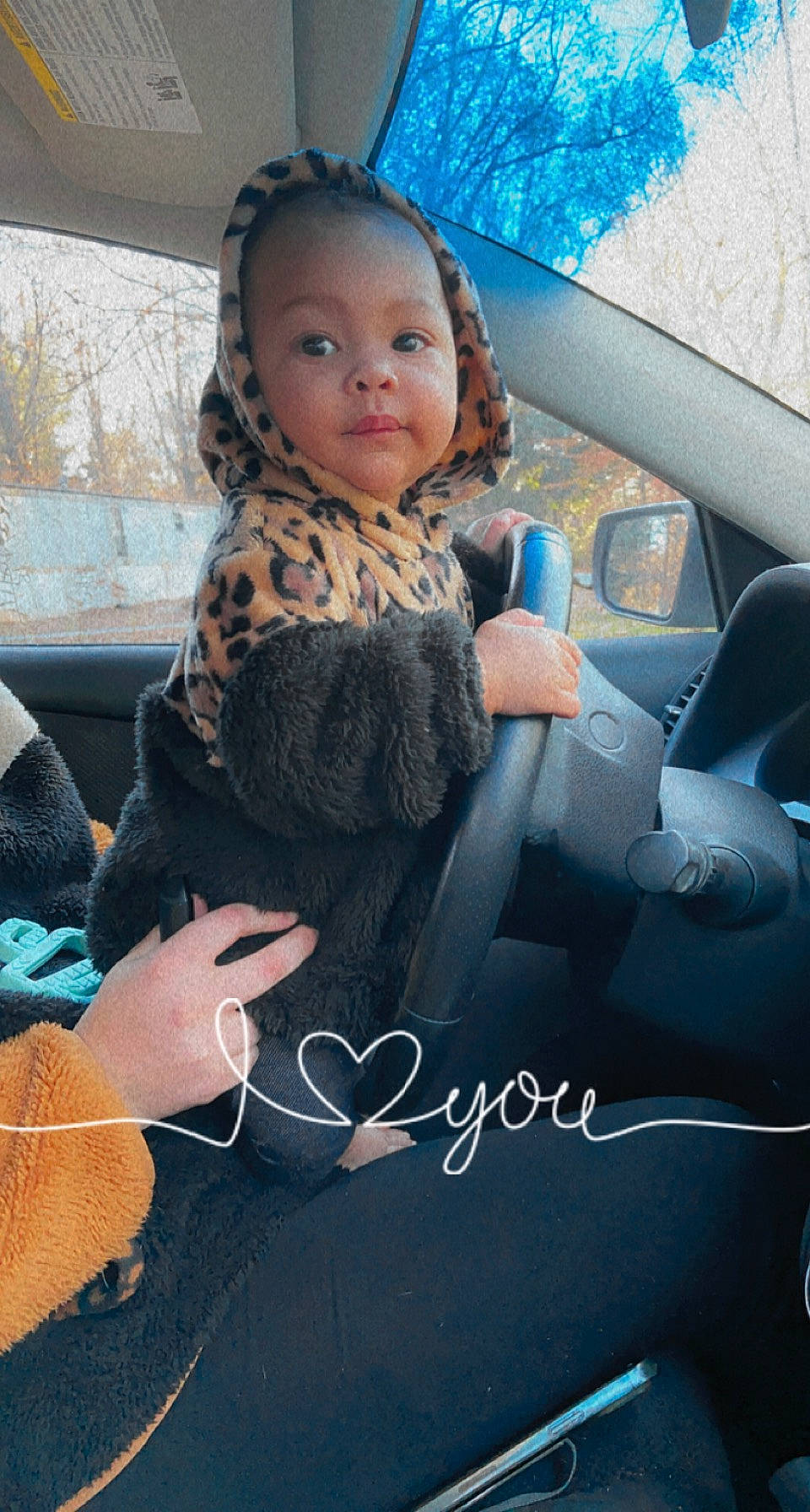 Maelynn joined the competition — help win amazing prizes! automotive_design, automotive_exterior, baby_toddler_clothing, car_seat, child, dress, electric_blue, face, finger, flash_photography, fun, gesture, happy, head, leisure, motor_vehicle, person, sitting, steering_wheel, toddler
