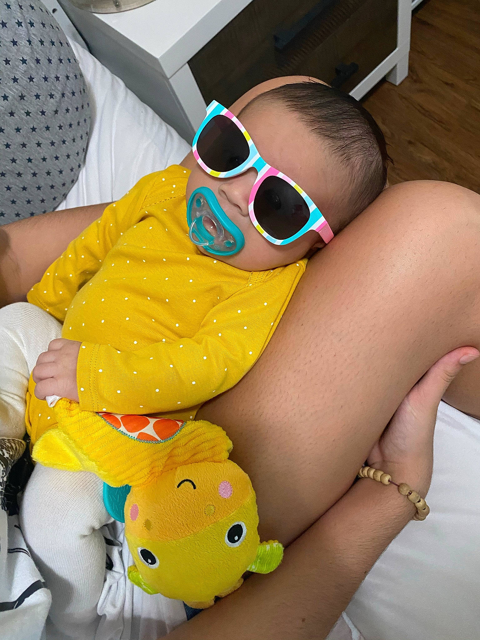 Everly joined the competition — help win amazing prizes! black_hair, comfort, cool, eyewear, finger, fun, glasses, goggles, happy, human_leg, joint, leisure, pattern, person, sitting, sunglasses, thigh, toy, vision_care, white