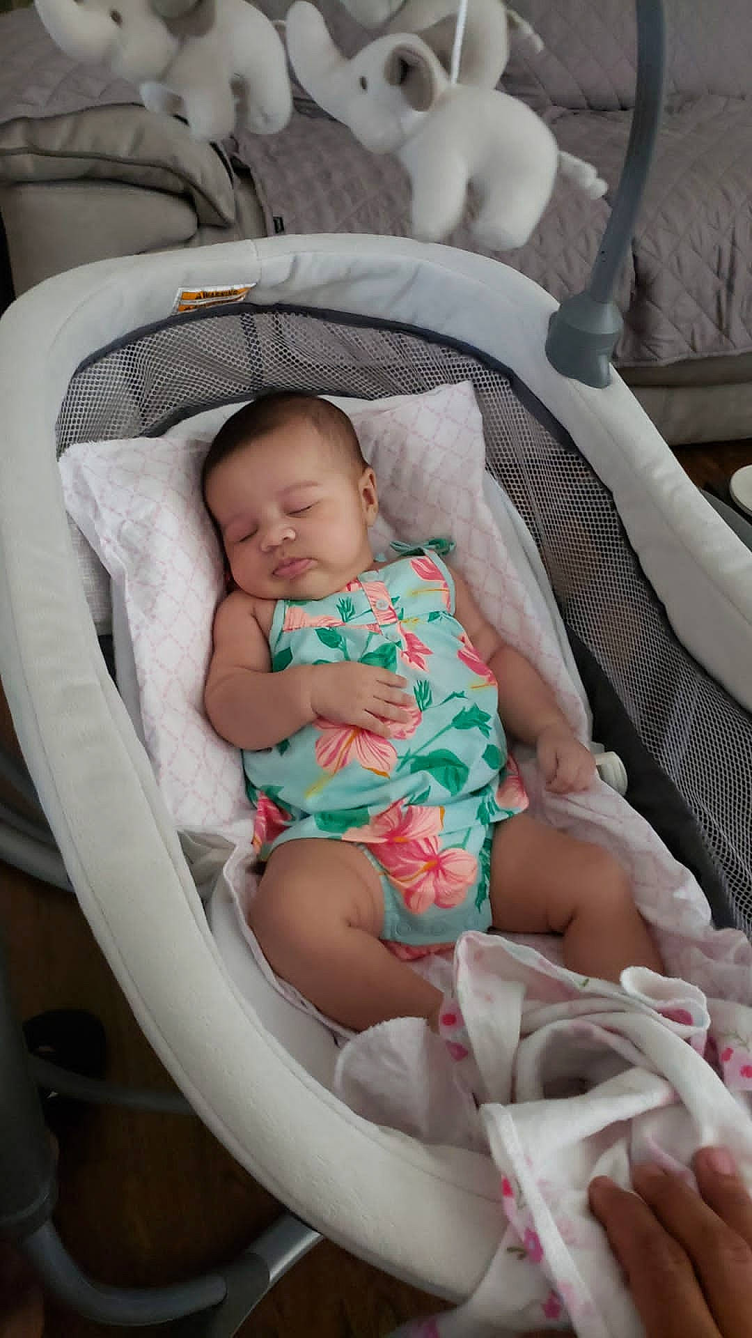 Everly Elise is registered to the contest to win money with this photo: baby, baby_products, child, comfort, face, finger, hairstyle, hand, head, human_body, infant_bed, leg, mammal, mouth, person, product, skin, textile, thigh, toddler