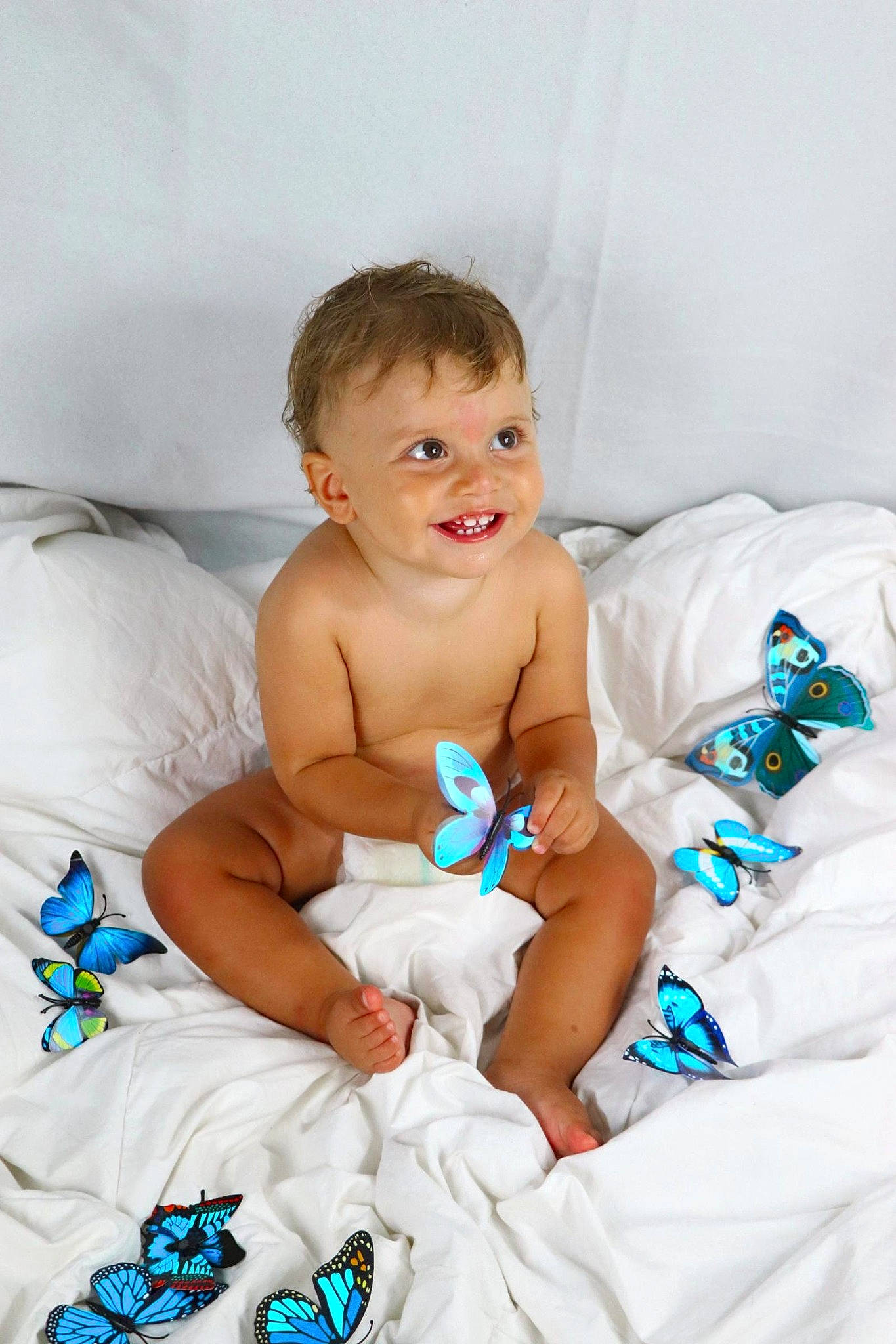 Roméo a rejoint le concours — aidez-le/la à gagner de superbes lots ! baby, blue, child, diaper, joy, linens, person, skin, smile, textile, toddler, turquoise, vacation