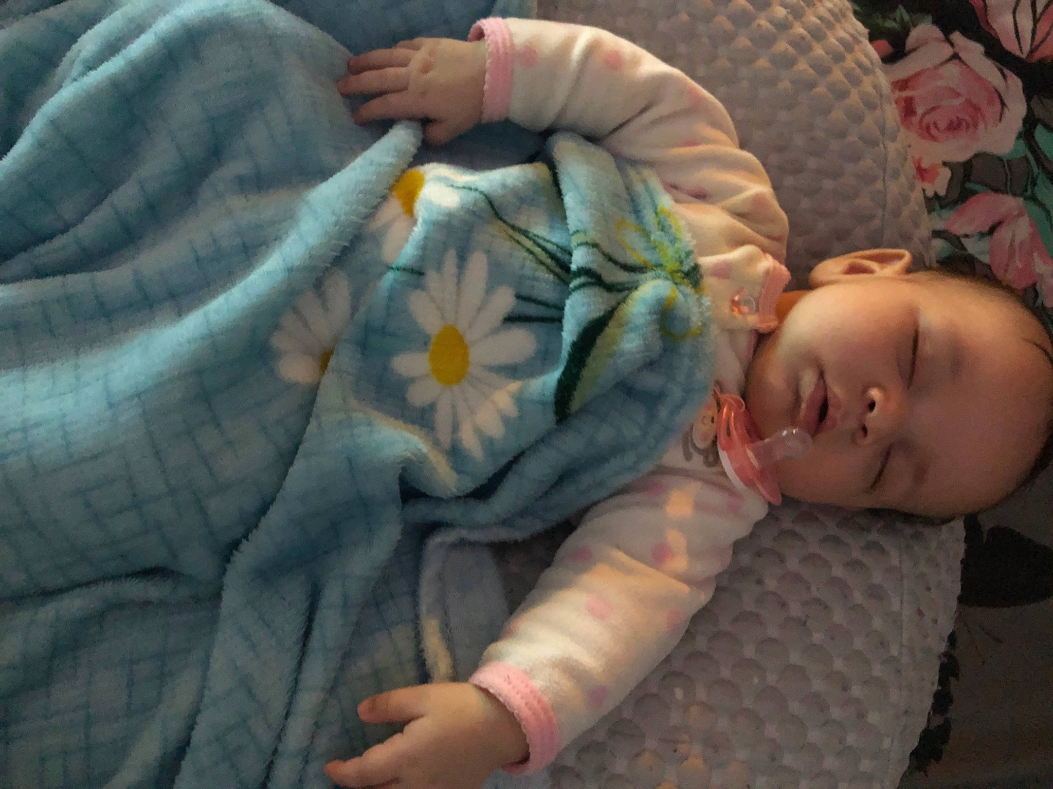 Italy is registered to the contest to win money with this photo: baby, baby_toddler_clothing, cheek, child, comfort, couch, finger, grass, hand, head, human_body, linens, mouth, pattern, person, room, sitting, skin, toddler, wood