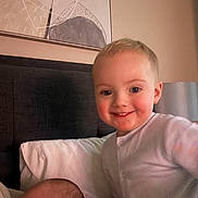 Frankie joined the competition — help win amazing prizes! baby, bed, blanket, child, cozy, cute, family, happy, headboard, home, indoor, infant, pajamas, pillow, portrait, resting, sibling, sleeping, smiling, young_child