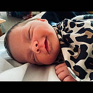 Rosalina joined the competition — help win amazing prizes! baby, sleeping, newborn, blanket, leopard_print, hand, cozy, face, closeup, soft, peaceful, child, infant, cute, portrait, rest, indoors, comfort, skin, relaxation