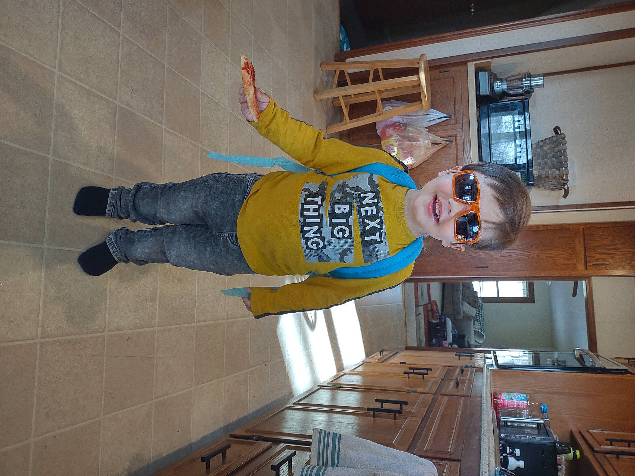 Jon joined the competition — help win amazing prizes! building, ceiling, child, engineering, flooring, fun, hardwood, machine, person, room, shelf, smile, t_shirt, table, wood