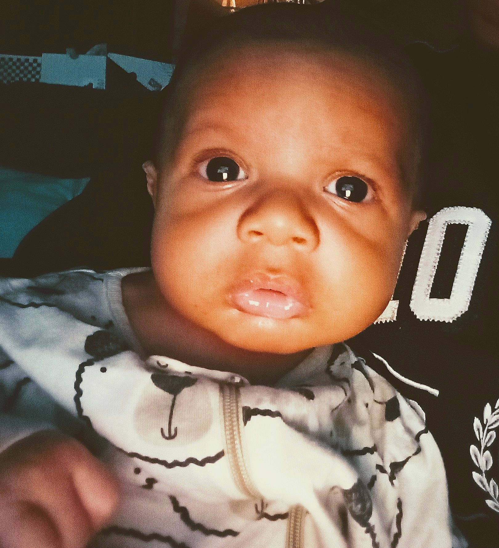 Keylan is registered to the contest to win money with this photo: baby, baby_toddler_clothing, cheek, cool, eyebrow, eyelash, finger, flash_photography, forehead, gesture, happy, iris, lip, mouth, neck, nose, person, skin, sleeve, thumb