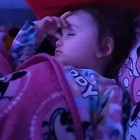 Lyriq is registered to the contest to win money with this photo: baby, bedtime, child, event, eyelash, flesh, fun, happy, magenta, mouth, nap, neck, pattern, person, pink, plant, purple, room, sleep, toddler