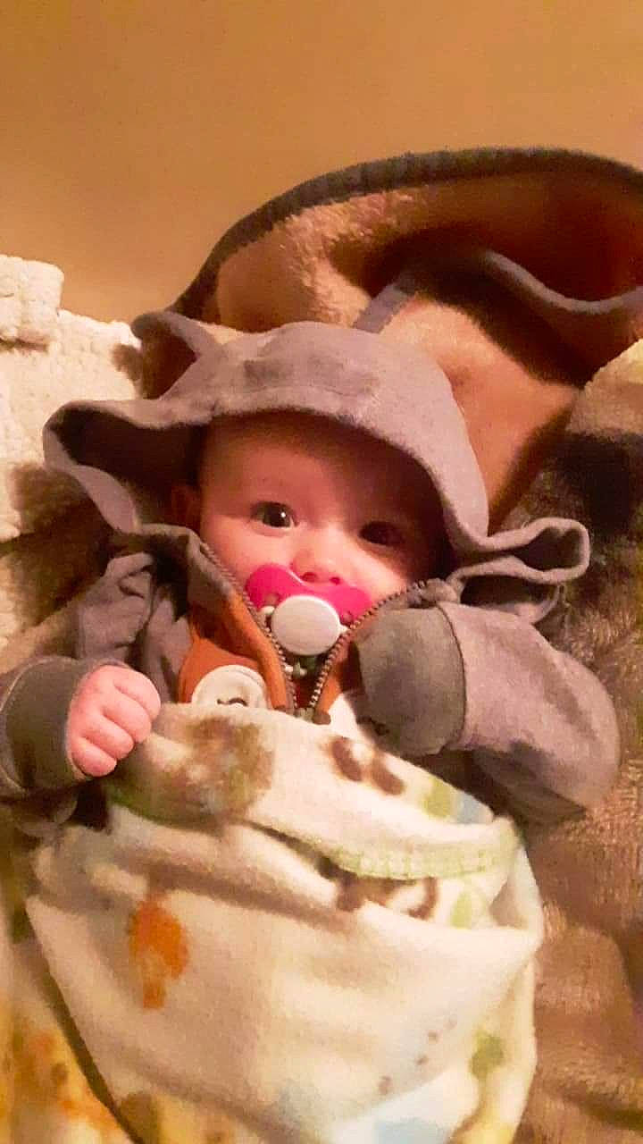 Lyriq is registered to the contest to win money with this photo: baby, baby_products, baby_toddler_clothing, cheek, child, comfort, doll, eyelash, fashion_accessory, fawn, fur, linens, nose, peach, person, pink, porcelain, skin, stuffed_toy, toddler