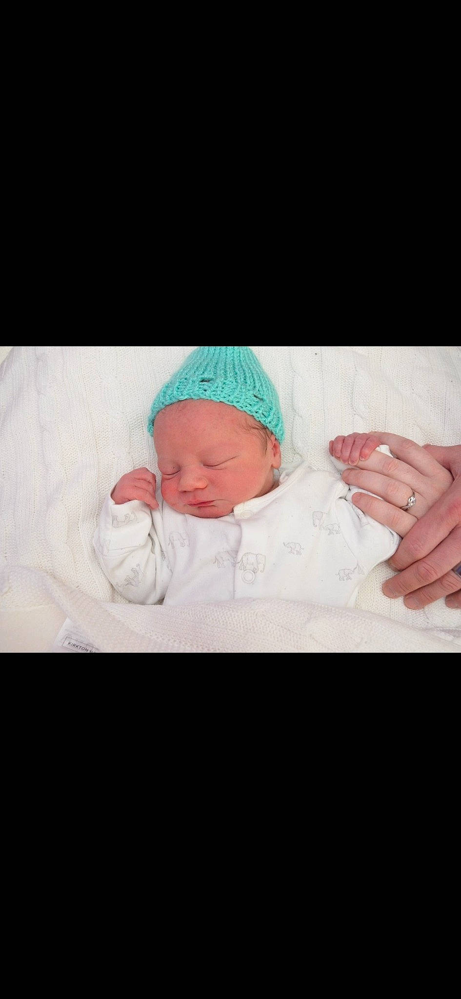 Freddie joined the competition — help win amazing prizes! baby, baby_products, baby_safety, baby_sleeping, baby_toddler_clothing, beanie, bedtime, cap, child, cloud, comfort, eye, happy, hat, human_body, knit_cap, linens, nap, person, sleeve