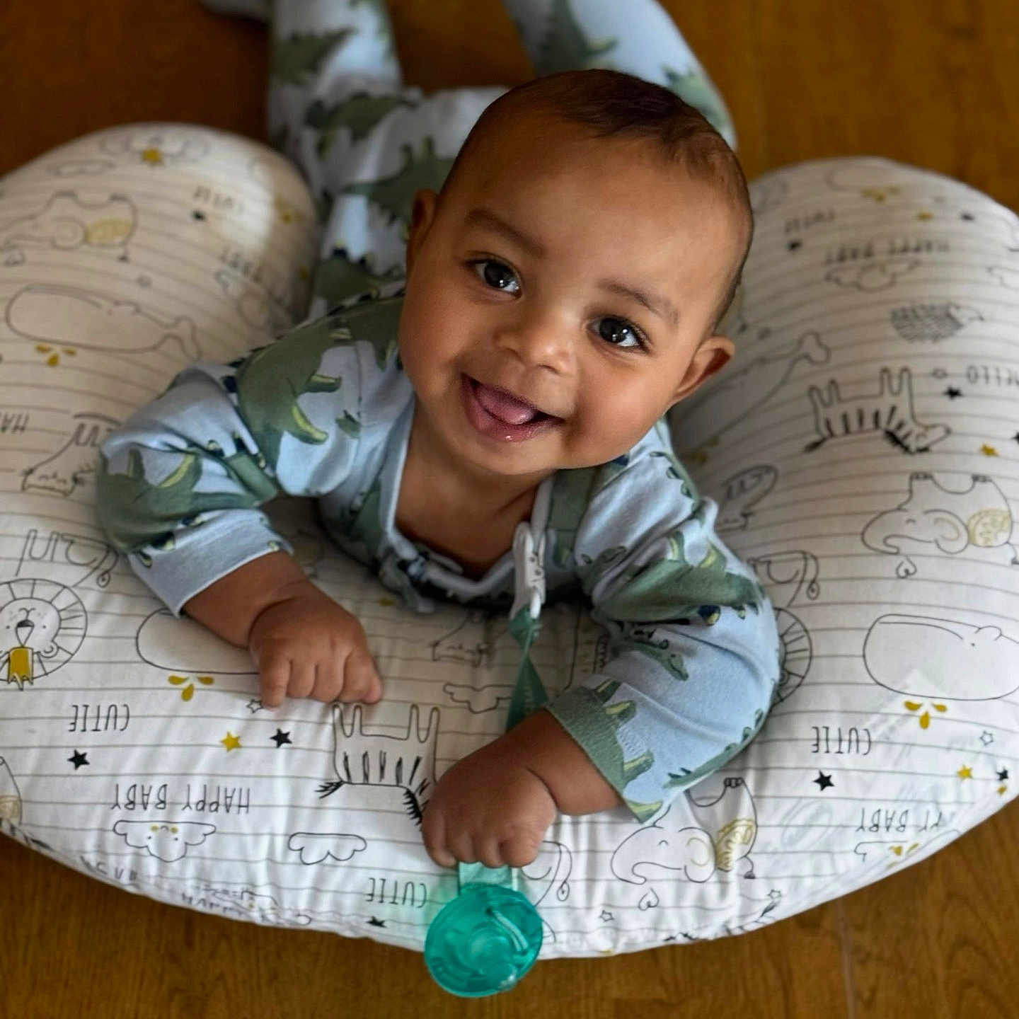 Shai is registered to the contest to win money with this photo: baby, babylaughing, clothing, couch, cushion, face, furniture, happy, head, homedecor, newborn, pajamas, pants, person, photography, pillow, portrait, quilt, sitting, smile