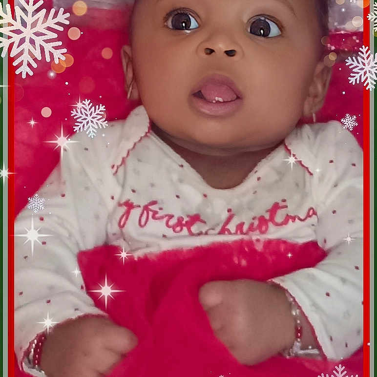 Amira K is registered to the contest to win money with this photo: accessories, applique, baby, bodypart, bonnet, clothing, doll, dress, envelope, face, finger, greetingcard, hand, hat, head, mail, person, photography, portrait, toy