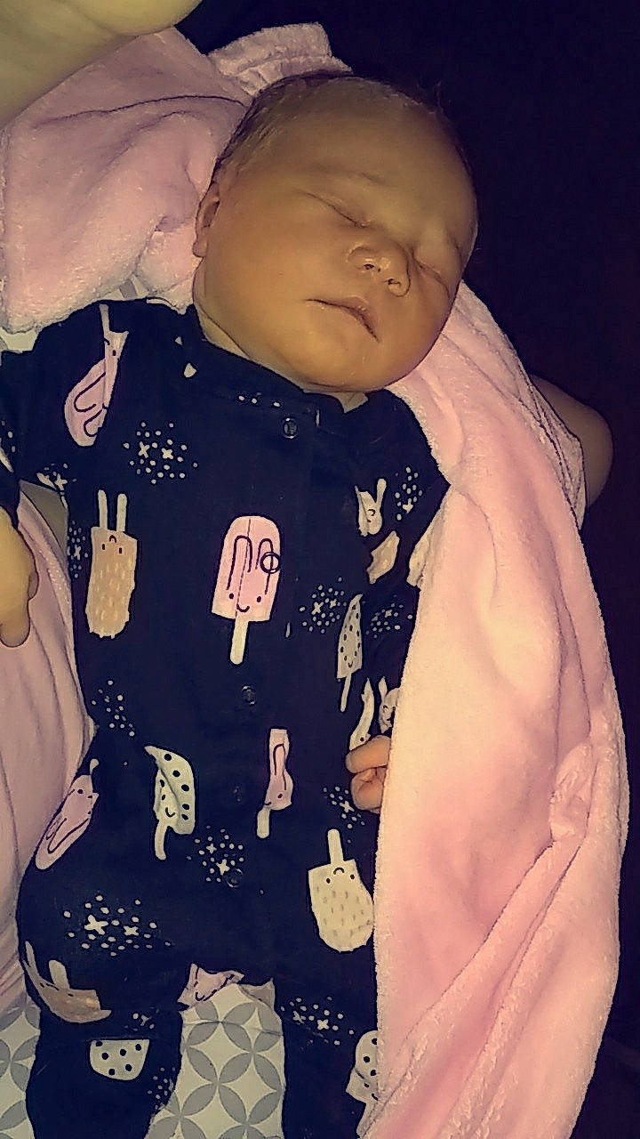 Sade is registered to the contest to win money with this photo: boy, child, cool, eye, face, forehead, fun, girl, head, human, infant, outerwear, person, product, skin, smile, space, textile, toddler