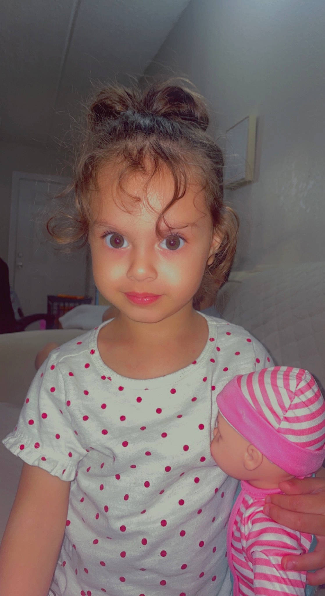 Serenity is registered to the contest to win money with this photo: baby_toddler_clothing, blond, brown_hair, cheek, child, chin, eyelash, facial_expression, hair, happy, iris, lip, nose, pattern, person, pink, room, skin, sleeve, toddler