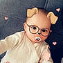 accessories, baby, bodypart, cartoon, couch, cushion, face, finger, furniture, glasses, hand, happy, head, homedecor, person, photography, portrait, selfie, smile, toy