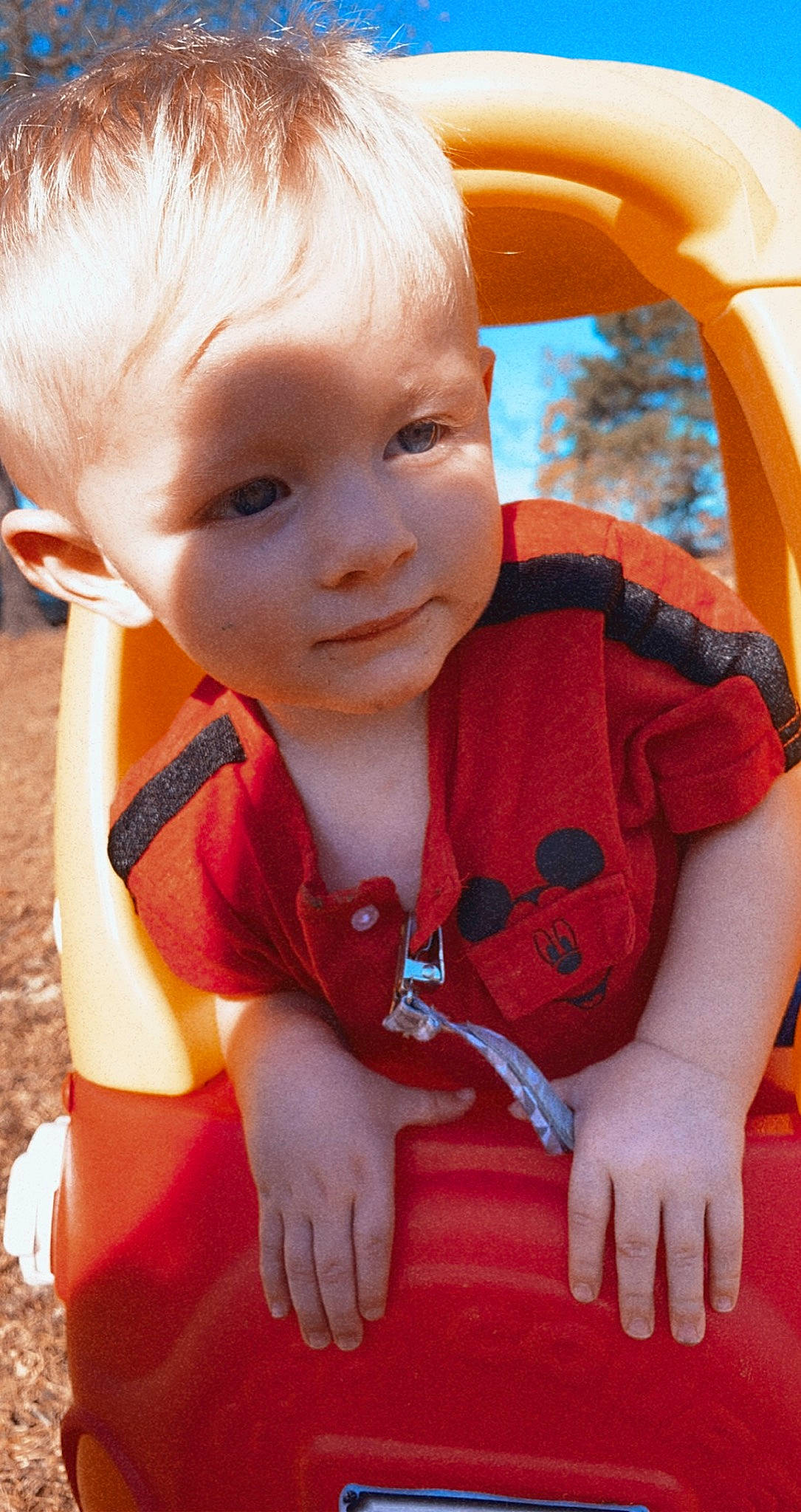 Jase is registered to the contest to win money with this photo: baby_toddler_clothing, cheek, chin, eye, facial_expression, gesture, hair, hairstyle, hand, head, human_body, iris, lip, mammal, mouth, nose, orange, person, product, skin