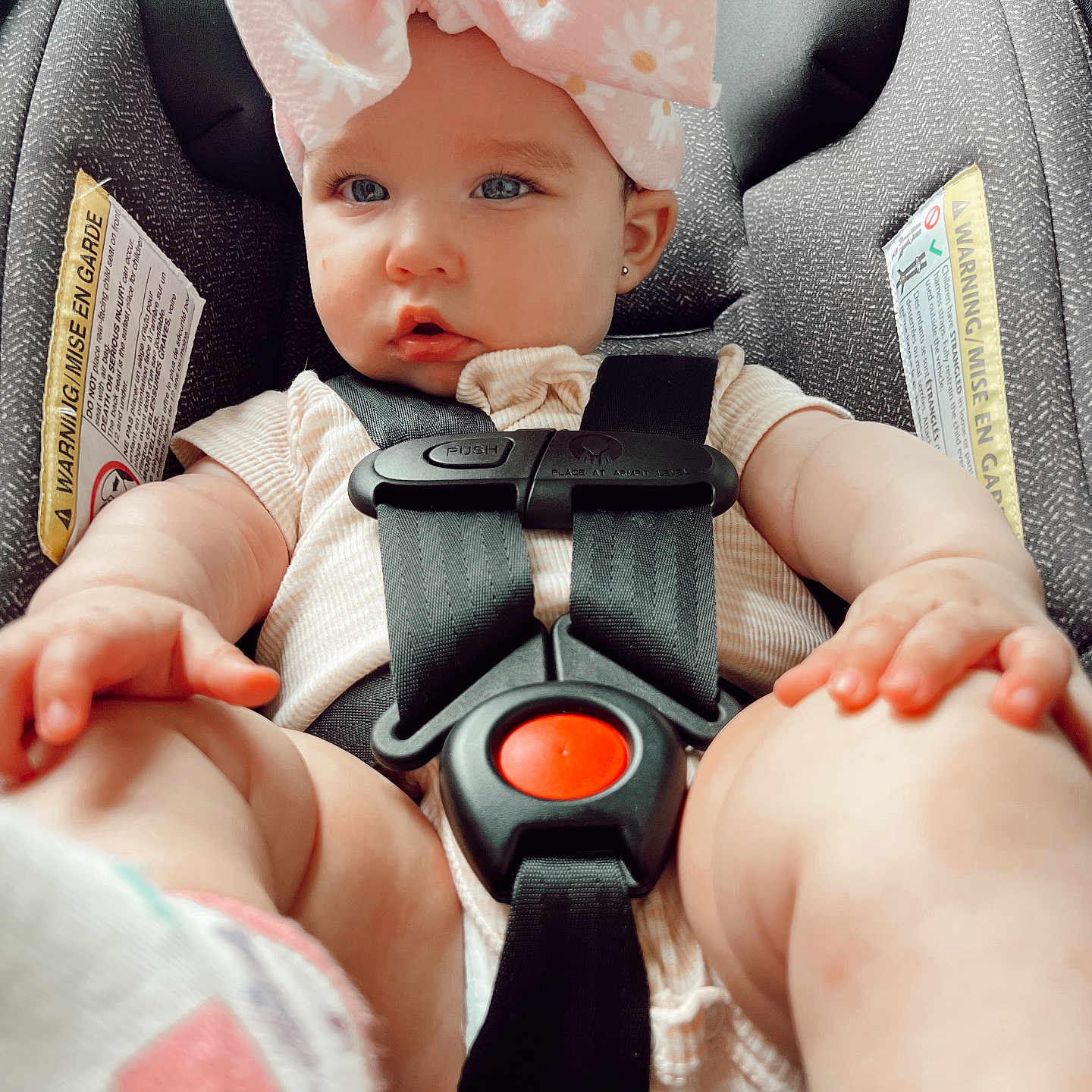 Ellianna joined the competition — help win amazing prizes! accessories, baby, belt, bodypart, bonnet, car, car_interior, carseat, clothing, cushion, face, finger, hand, hat, head, person, photography, portrait, transportation, vehicle