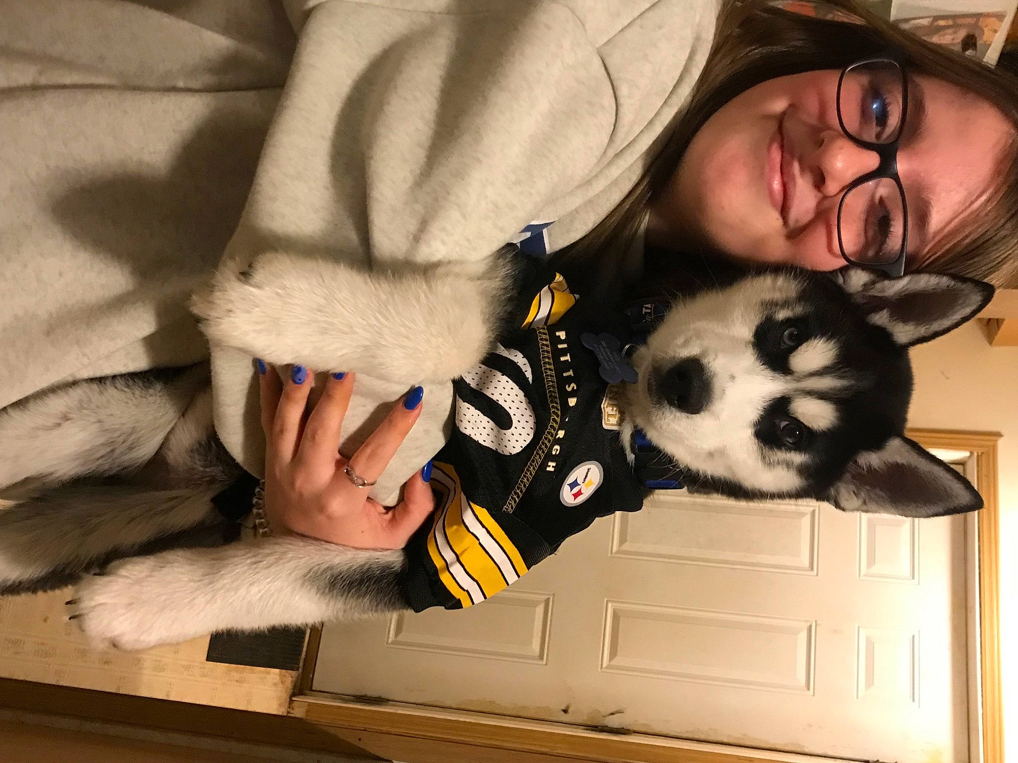 Korra is registered to the contest to win money with this photo: canidae, carnivore, comfort, companion_dog, cool, dog_breed, eyewear, fawn, felidae, finger, fur, gesture, hand, headgear, small_to_medium_sized_cats, smile, textile, vision_care, whiskers, wrist