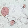 baby, newborn, sleeping, infant, onesie, hat, blanket, cartoon, cute, cozy, peaceful, child, soft, bed, pajamas, face, hand, foot, lying, indoors