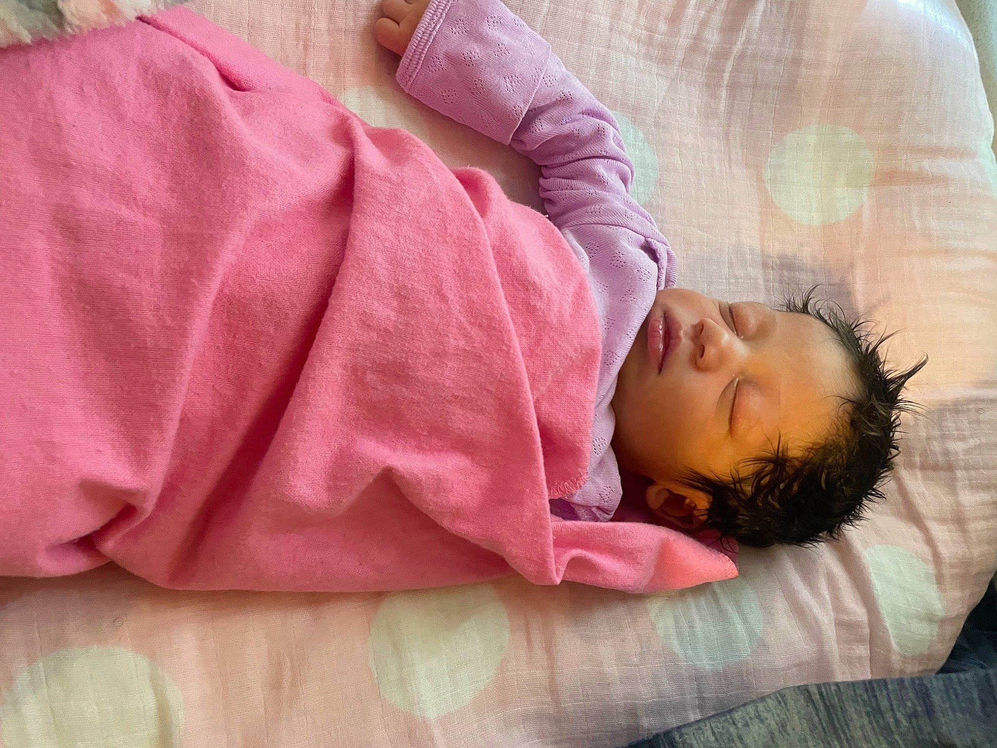 Zaliyah is registered to the contest to win money with this photo: baby, baby_sleeping, baby_toddler_clothing, bed_sheet, bedding, bedtime, child, comfort, flooring, fur, linens, magenta, nap, person, room, sitting, skin, sleeve, textile, toddler