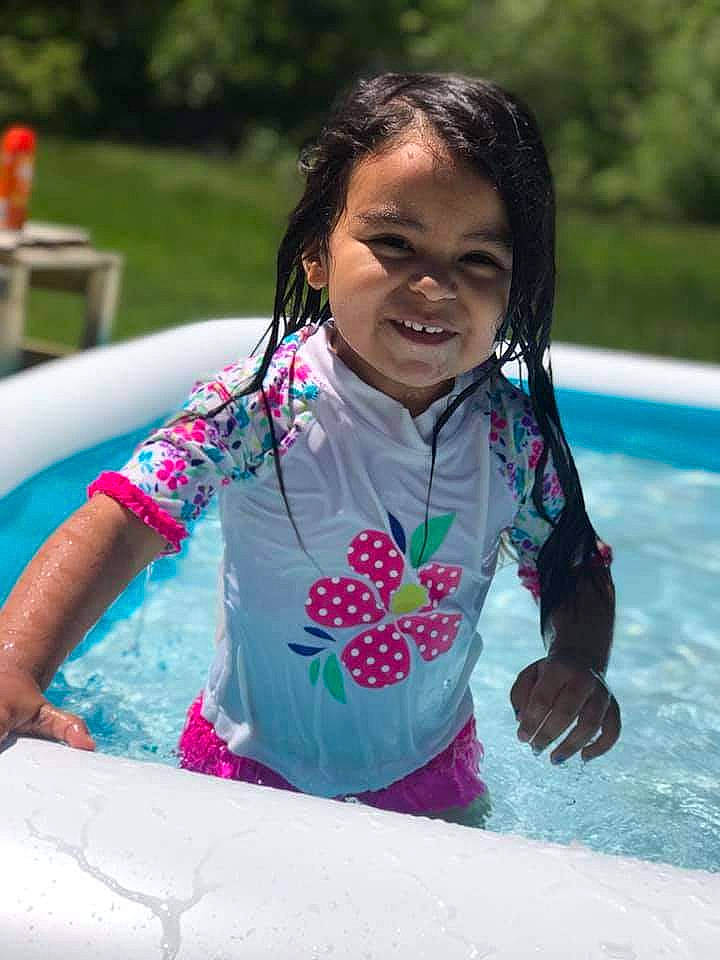 Maria is registered to the contest to win money with this photo: child, fun, happy, joy, leisure, person, play, recreation, smile, summer, swimming_pool, vacation