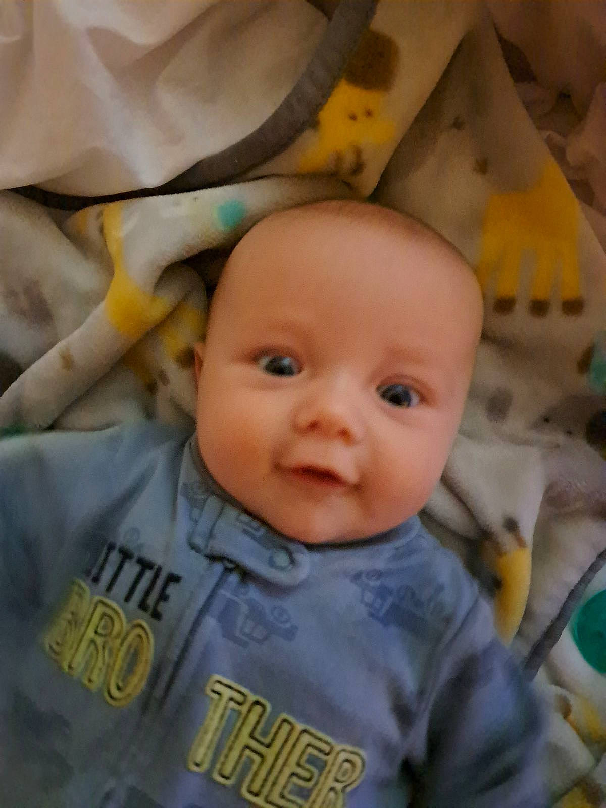 Wyatt is registered to the contest to win money with this photo: baby, baby_products, baby_toddler_clothing, cheek, chin, collar, eye, eyebrow, happy, head, iris, mouth, nose, person, product, skin, sleeve, smile, textile, toddler