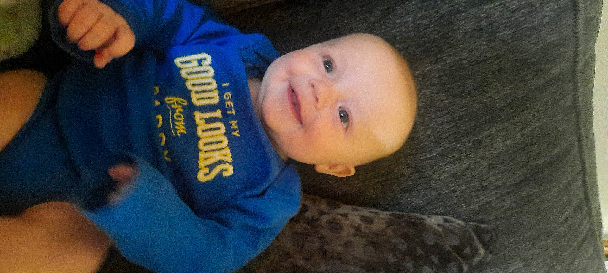 Wyatt joined the competition — help win amazing prizes! baby, baby_laughing, baby_toddler_clothing, cheek, child, elbow, electric_blue, fun, happy, joy, nose, person, sitting, sleeve, smile, t_shirt, thumb, toddler, tree, wood